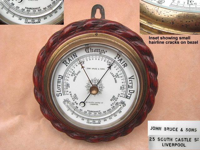 Victorian barometer with curved thermometer, in ropetwist carved oak surround